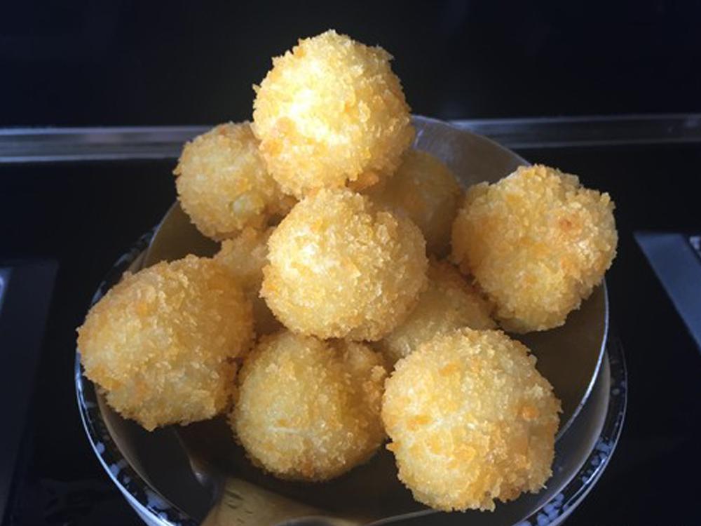 油炸丸子，一道美味佳肴的魅力与制作艺术，油炸丸子，美味佳肴的魅力与烹饪艺术之道